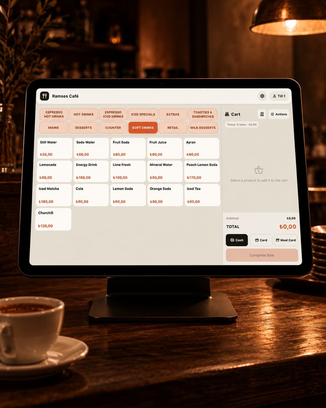 Ramses quick-sale screen displayed on a tablet at a café counter